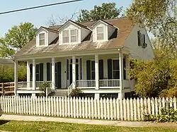Dorgan Cottage, a Creole cottage built in 1860 at 22 South Lafayette Street
