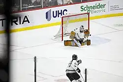 Frankel catches a puck during a game against the Minnesota Frost, February 2024