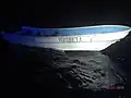 Coast Guard Cutter Escanaba (WMEC-907) intercepted the Yosibell, a 25-foot makeshift boat with 21 migrants on board, in the Mona Passage on May 20, 2019