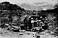 South African 25-pounder gun fires on Amba Alagi.