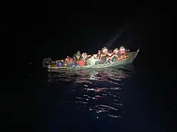 Coast Guard Cutter Escanaba (WMEC-907) intercepted this 30-foot makeshift boat with 28 migrants on board in the Mona Passage on May 21, 2019