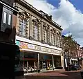The second Town Hall of 1900, on the opposite side of High Street, now in use as a shop.