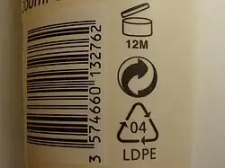 PAO symbol, along with the Green Dot symbol and resin identification code on a bottle of lotion.