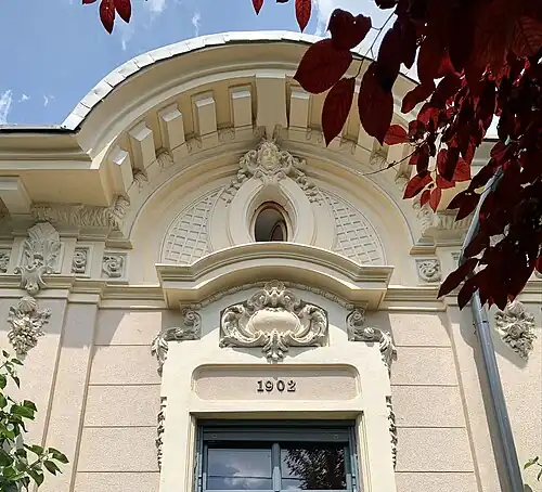 Cartouches and other ornaments of the Maria D. Nicolau House, Bucharest, unknown architect, 1902[56]