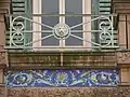 Painted design at roof level.