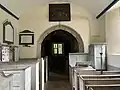 Interior of the Church of St Andrew, Holcombe, looking east to the chancel.