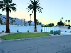A picture of a white mid-century modern home