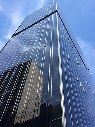 Black facade panels on the building's southeast corner in 2023