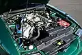 1999 SVT Cobra convertible engine with a modified intake and battery.