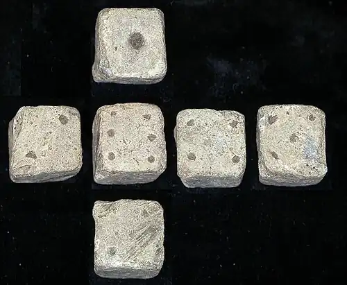Composite image of all sides of a 12&nbsp;mm (1⁄2&nbsp;in) Roman die, found in Leicestershire, England