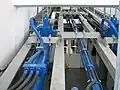 Hydraulic cylinder for cable tension