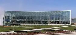Picture of a modern office-like building with extensive glass facade.