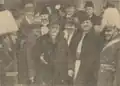 1933 - A. C. Cuza surrounded by sympathizers and two gendarmes in front of the Assembly of Deputies, following the inauguration of the 1933 Parliament.
