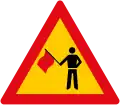 Flagman ahead