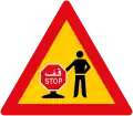 STOP/GO manual traffic control ahead