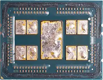 AMD EPYC 7702 after delidding, with remains of solder thermal interface material (TIM)