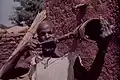 A man is sounding the warhorn.