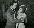 Resisting the pleas of her former dancing partner, Milly refuses to return to the café