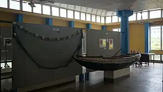 A canoe and net at the museum