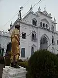 A statue holding chain for earthing purpose at main gate
