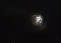 J125013.50+073441.5 taken by Hubble as part of a study named LARS (Lyman Alpha Reference Sample)[21]