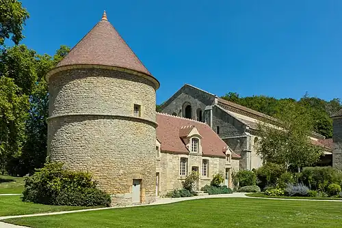 View of the dovecote and church