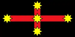 A 1:2 variant of the Eureka Flag in the colours of the Aboriginal flag