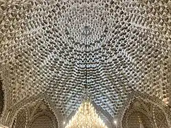 Interior of the main prayer hall topped by a dome intrados decorated with muqarnas.