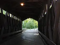 Inside, showing Brown truss stringers.