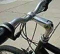 Adjustable quill stem with a removable face plate.