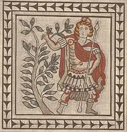Aeneas, standing in the armour of a Roman soldier, plucks a branch from a large bush to the left of the image.