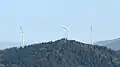 Tower to the left of the two turbines in the center