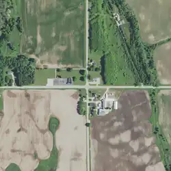 County Trunk Highway OO runs east–west and S. Shiloh Road runs north–south. Schuyler Creek (right) flows southeast