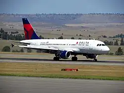 Image 3An Airbus A319 waits at Billings Logan International Airport. (from Transportation in Montana)