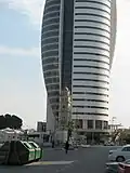 The mosque alongside the nearby Sail Tower