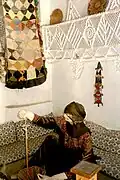 Mannequin display depicting traditional scene