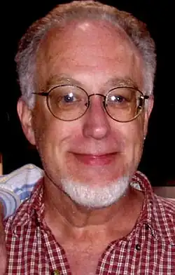 Headshot of Gordon smiling