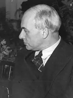 black-and-white profile photo of Bush's head, looking left