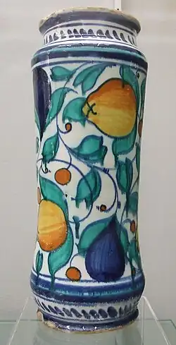 An albarello (drug jar) from Venice or Castel Durante, 16th century. Around 30&nbsp;cm high. Decorated in cobalt blue, copper green, antimony yellow, and yellow ochre. Burrell Collection