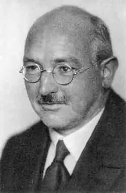 Image 49German physicist Albert Betz had a crucial role in the development of wind turbine technology. Betz's law states that no wind turbine can capture more than 59.3% of the wind's kinetic energy. (from Wind turbine)