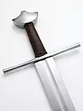 Replica of a type XI sword with a "cocked-hat" pommel (type D), typical of the early 13th century