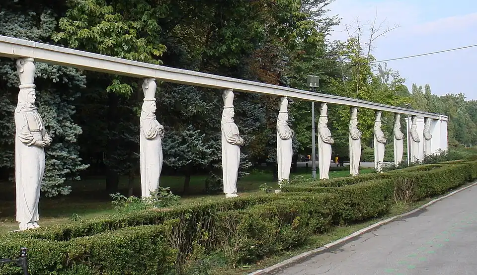 Neoclassical caryatids of the Alley of Caryatids in the Herăstrău Park, Bucharest, dressed like Romanian peasant women, sculpted by Constantin Ricci, 1939[36]