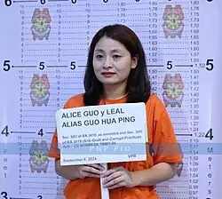 A mug shot of Guo