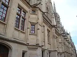 Detail of the alignment of gargoyles on the neo-Gothic facade of rue aux Juifs (late 19th century).
