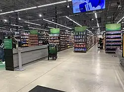 Amazon Fresh store in Naperville, IL, with a Dash Cart in the background