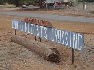 Nudist crossing sign