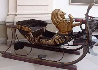18th c. parade sleigh with gilded lion, Cinquantenaire Museum, Belgium