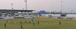 This stadium hosting a football game.