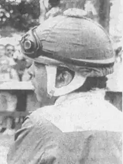 Black-and-white profile view of Cordero in a jockey's cap