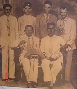 Group of civilians that ambushed Zé Baiano pose for a photograph in Aracaju, 29 June 1936. From left to right, standing, Pedro Sebastião de Oliveira "Pedro Guedes", Antônio de Souza Passos "Toinho", José Francisco de Souza "Biridin" and José Francisco Pereira "Dedé". And seated, Antônio de Chiquinho and Pedro Francisco "Pedro de Nica".[2]